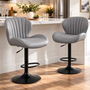 COLAMY grey adjustable swivel bar stools set of 2 with faux leather seats and high backrests at a modern kitchen island.